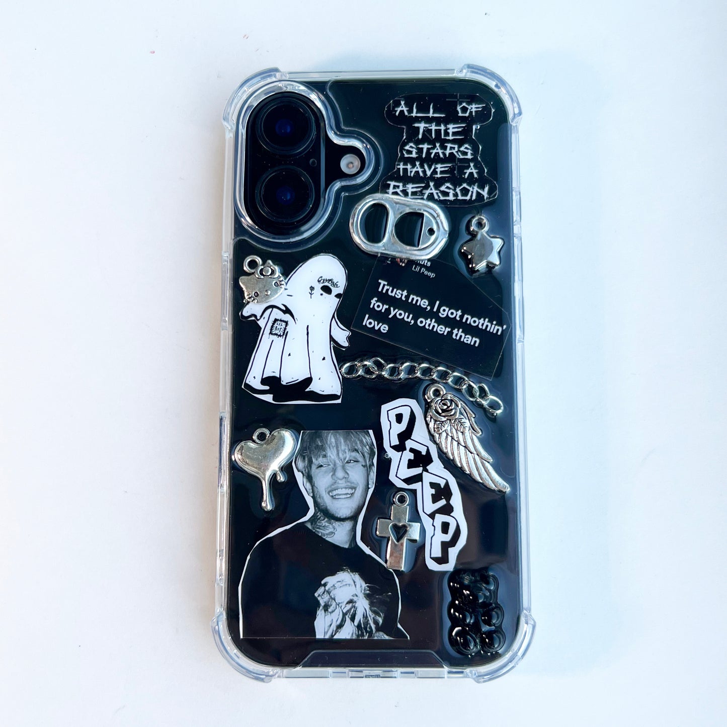Handmade custom Lil Peep collage phone case featuring emo goth stickers, an iconic portrait, a white ghost, metal chains, a cross charm, soda tab, and the lyrics 'Trust me, I got nothin' for you, other than love' on a white background.