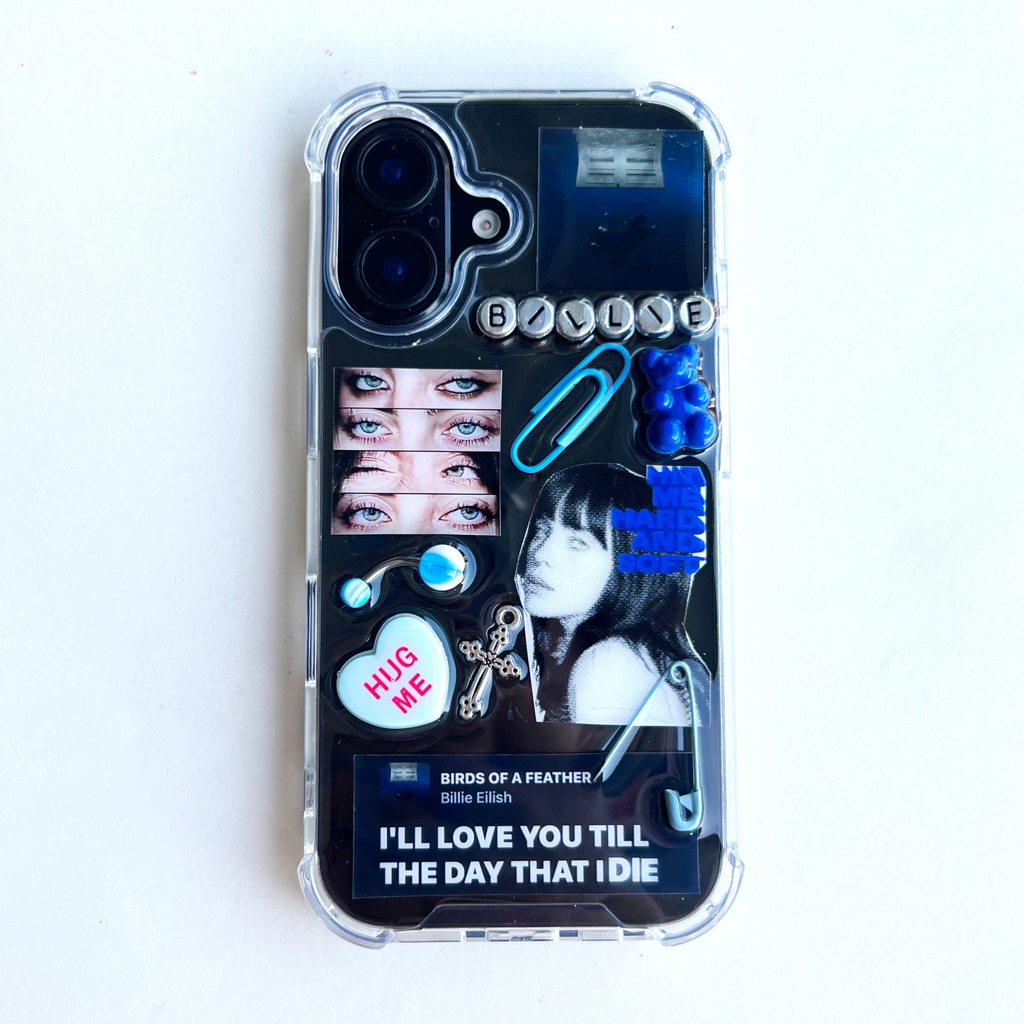 Billish eilish custom collage resin phone case featuring a collage design inspired by Billie Eish's 'Birds of a Feather' song, with, a blue paperclip, a blue heart, and text reading 'I'LL LOVE YOU TILL THE DAY THAT IDIE'.