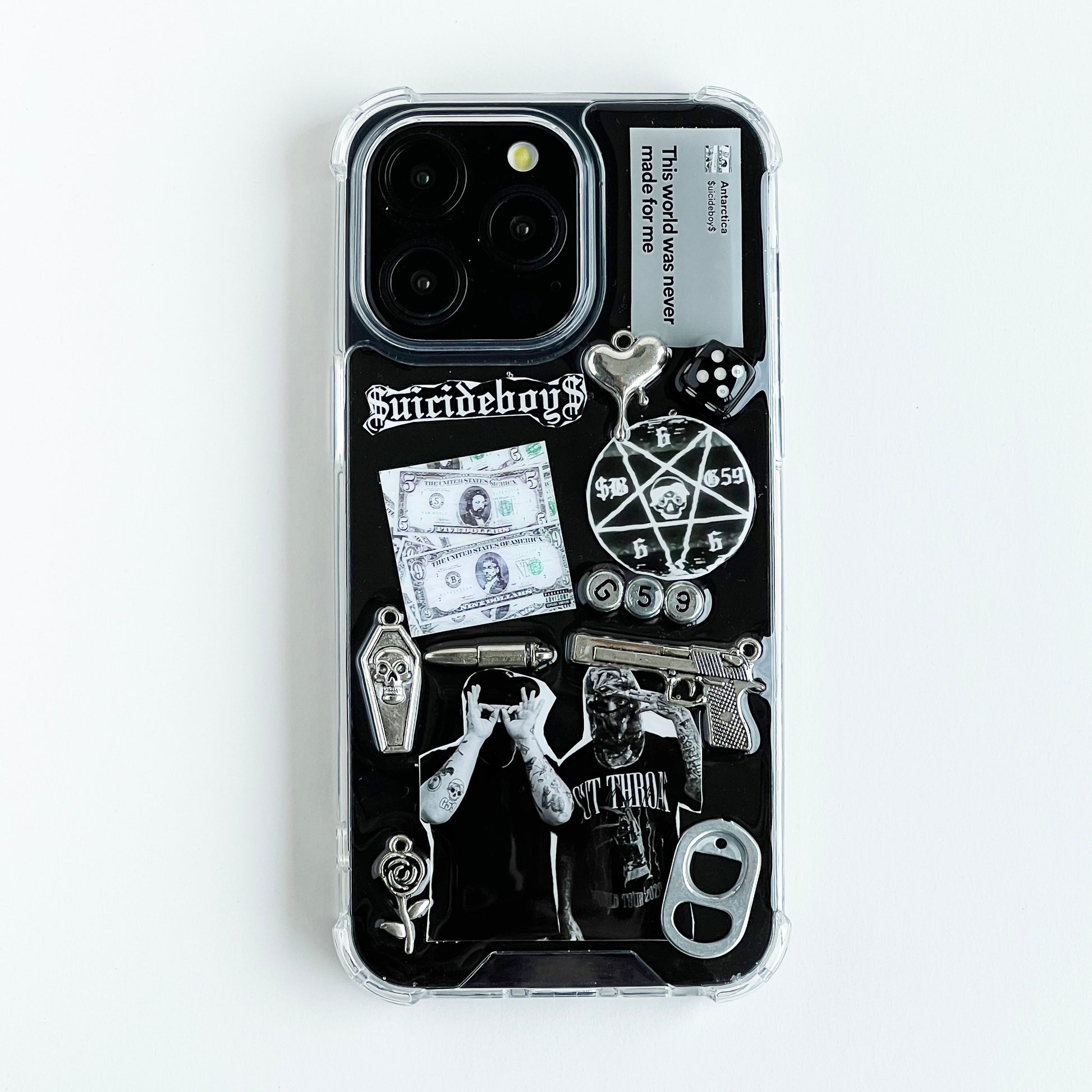 custom suicideboys $uicideboy$ Phone case decorated with Suicideboys band merchandise graphics, including a black-and-white graphic print, a pentagram, a skull, a revolver, a dollar bill, dice, and gothic text, shown on a plain white background.